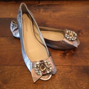 Gold peep-toe flat with sparkle detail